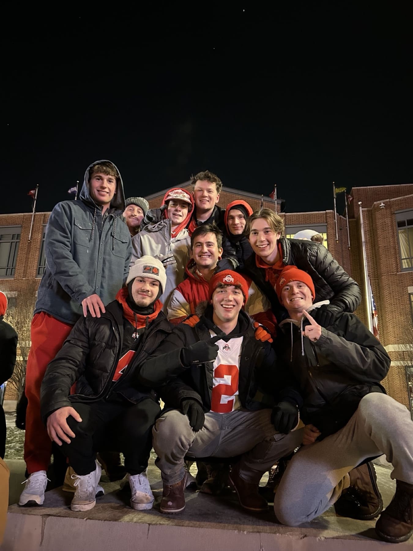Friends gathered outside after a college football championship
